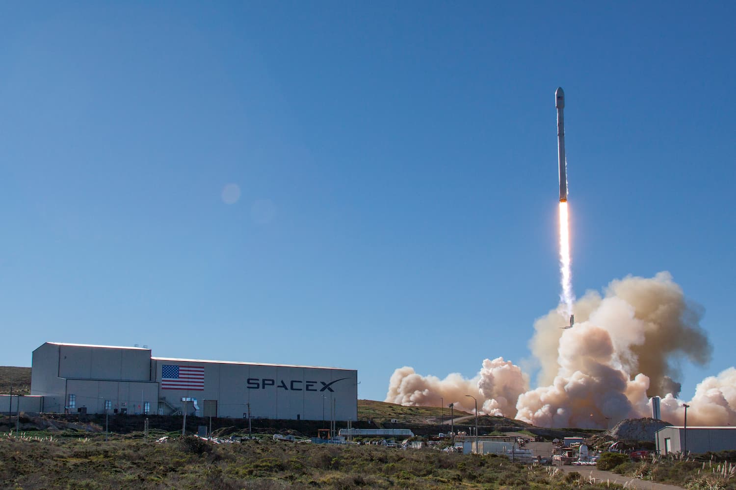 Background SpaceX Falcon 9 Iridium-1 launch.